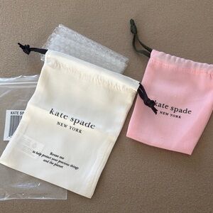 Kate Spade Pink like new and White NWT Drawstring Bags